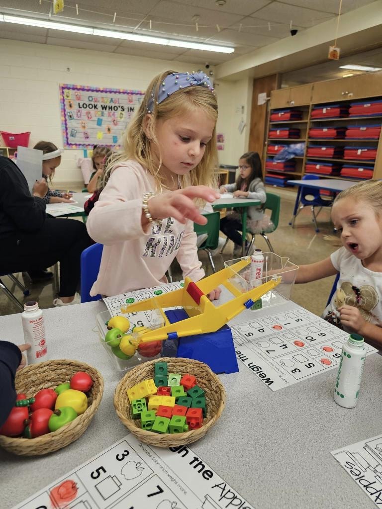Children learning math with manipulatives