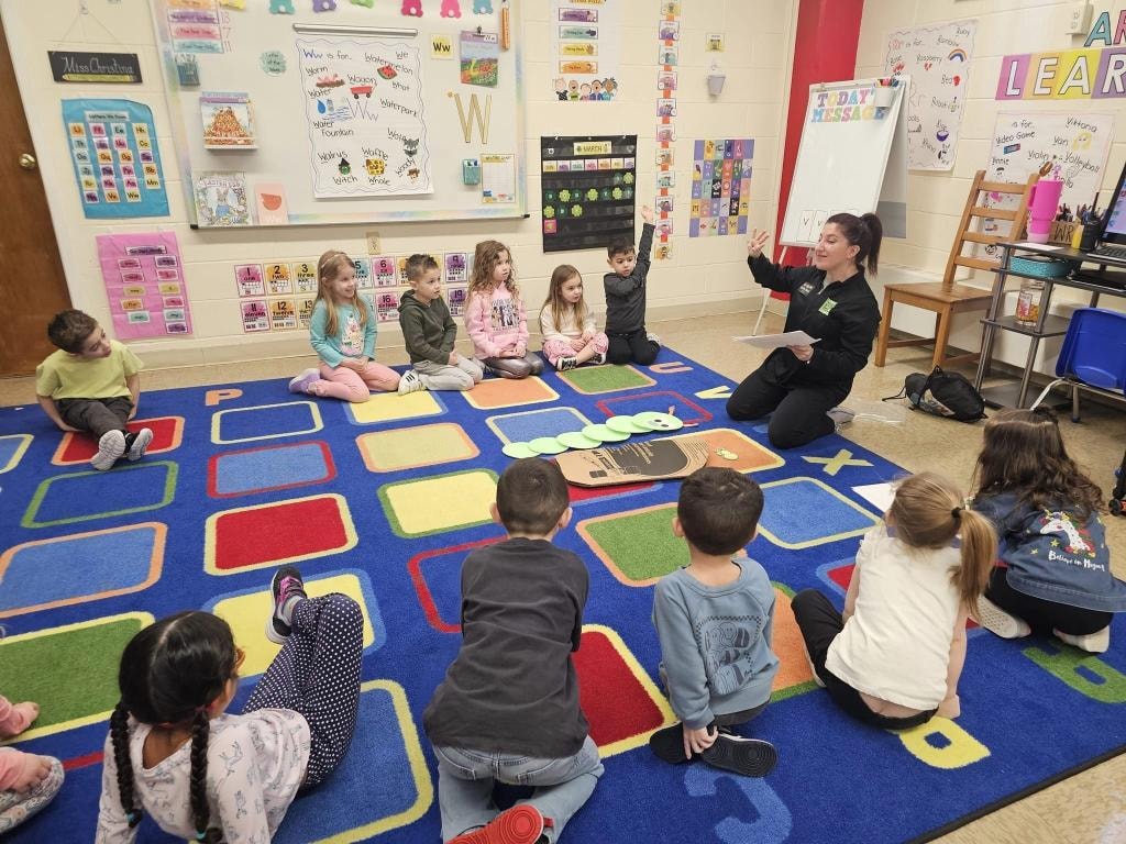 Teacher leading classroom circle time lesson